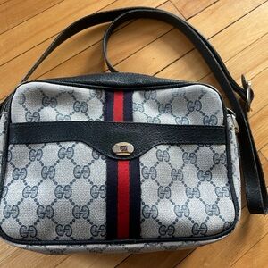 Vintage Gucci bag in classic navy blue.